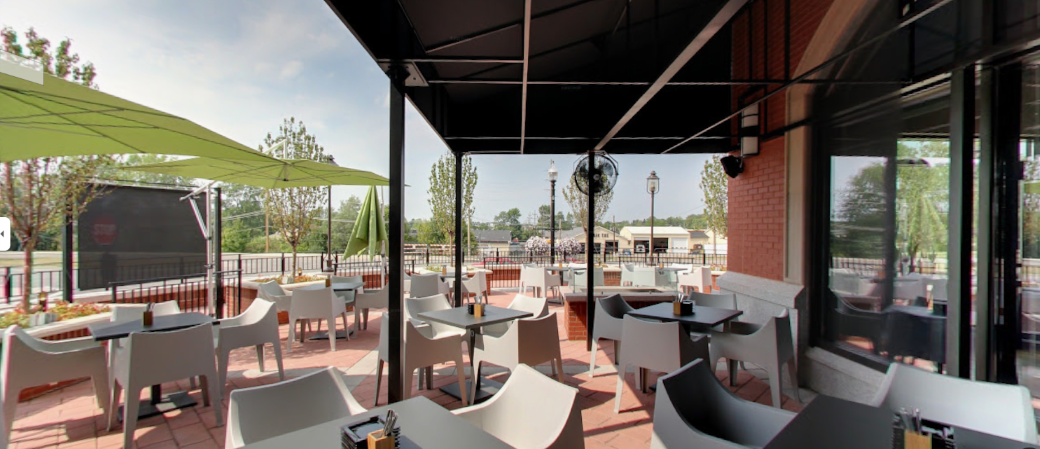 The large covered dog-friendly patio at Divvy in Carmel City Center